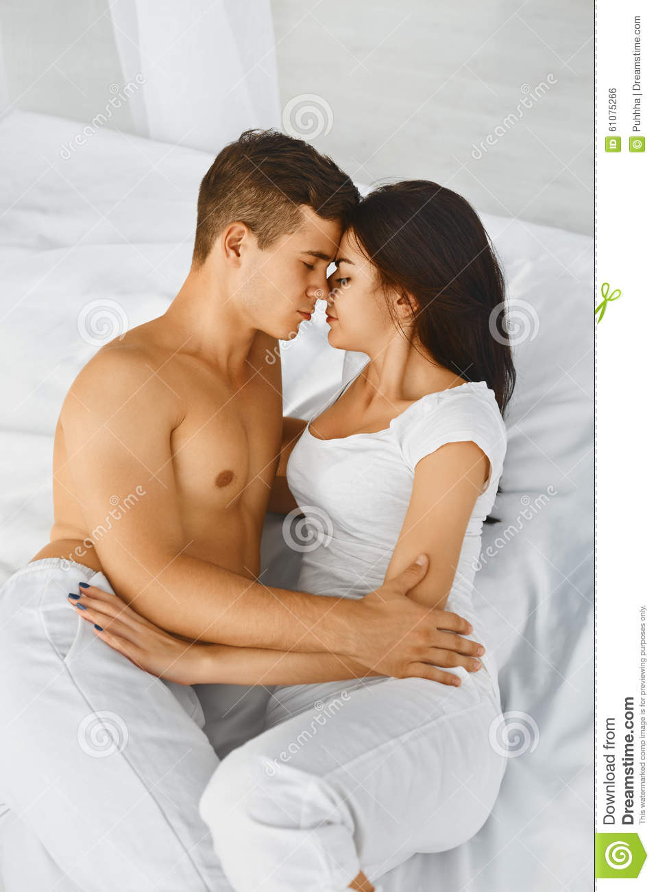 man-woman-loving-each-other-close-up-portrait-young-romantic-men-women-hugging-kissing-laying-down-white-bed-love