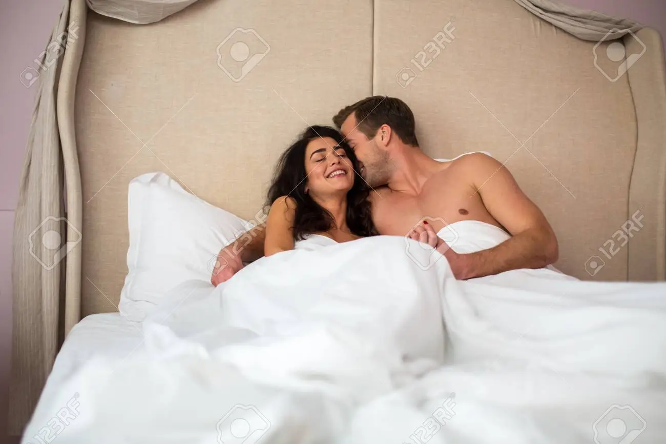 young couple love sex on bed