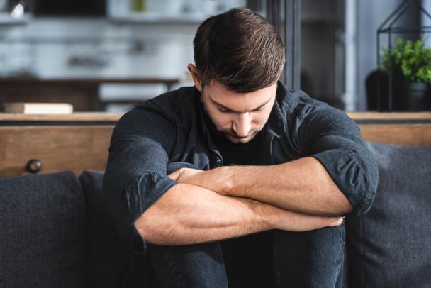 handsome-sad-man-shirt-hugging